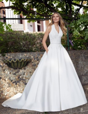 Model in Ronald Joyce style 69508, an elegant halter neck lace and Mikado wedding ballgown wedding dress with a plunging beaded bodice